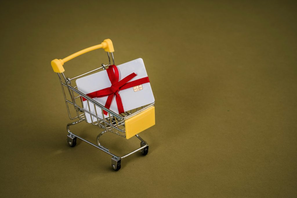 An image of a giftcard wrapped with a bow, ready to sell